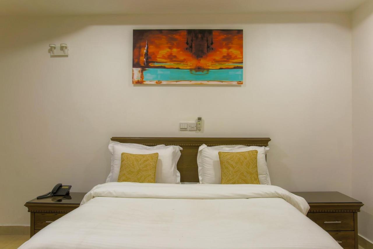 Sleep Inn Hotel - City Centre Дар-эс-Саламе Экстерьер фото