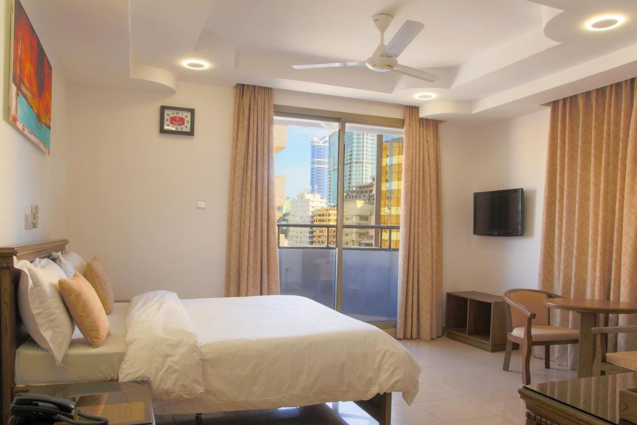 Sleep Inn Hotel - City Centre Дар-эс-Саламе Экстерьер фото