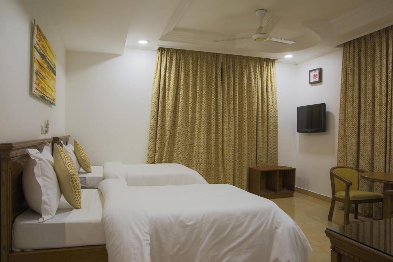 Sleep Inn Hotel - City Centre Дар-эс-Саламе Экстерьер фото