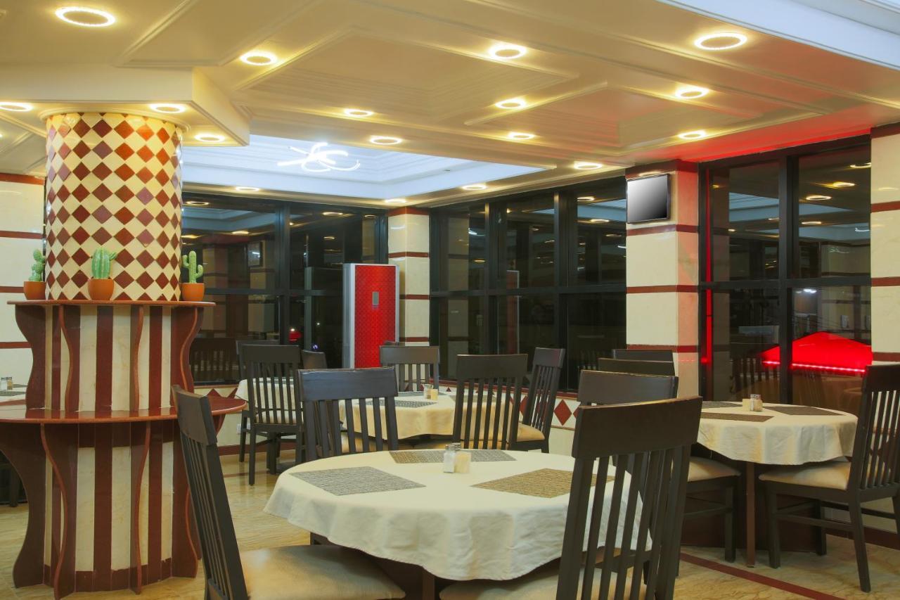 Sleep Inn Hotel - City Centre Дар-эс-Саламе Экстерьер фото