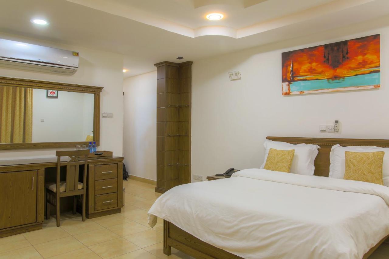 Sleep Inn Hotel - City Centre Дар-эс-Саламе Экстерьер фото