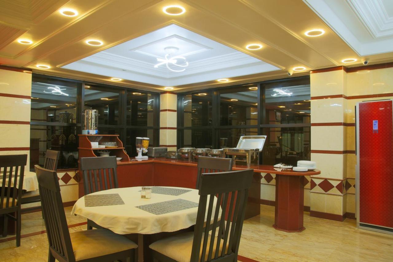 Sleep Inn Hotel - City Centre Дар-эс-Саламе Экстерьер фото